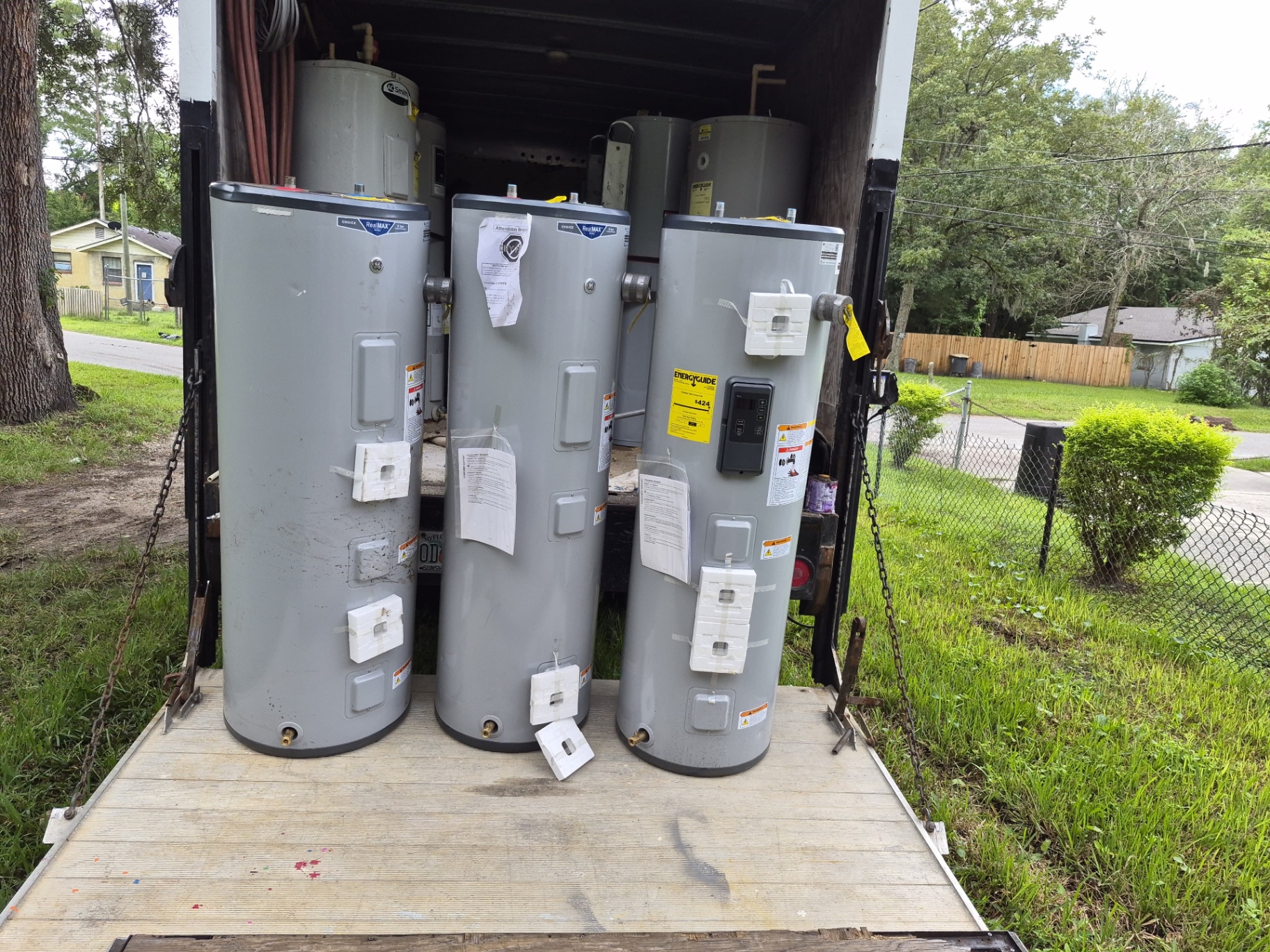 New 2025 electric water heater tanks loaded on the Teater's Water Heaters truck